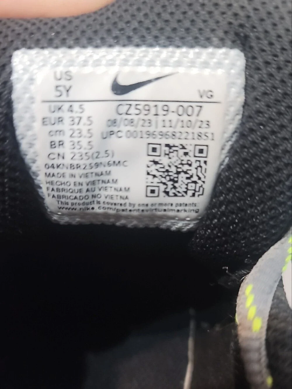 Nike Gray Cleetd with White Swoosh and Lime Laces 5Y